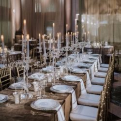 wedding venue in Philadelphia with a long table decorated with candles and flowers.