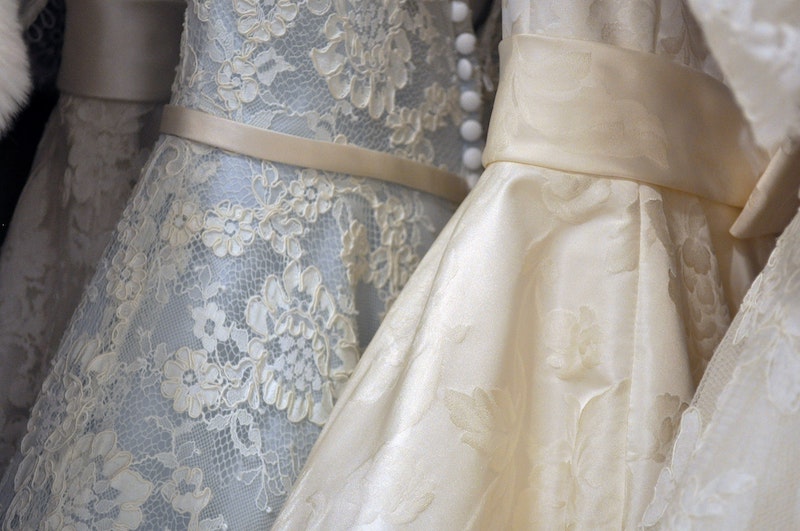 cheap-wedding-dresses-philadelphia-wedding-photographers-bridal-shop-rack-lace-wedding-gown