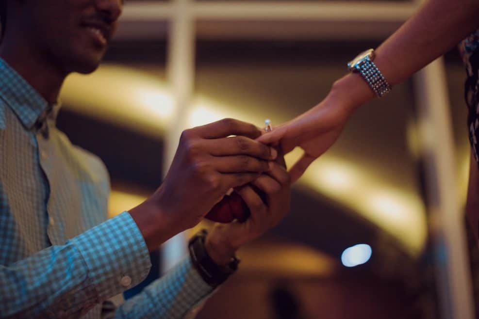 proposal-man-on-knee-putting-ring-on-hand-engagement-photography-philadelphia